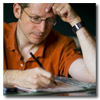 man filing out a form